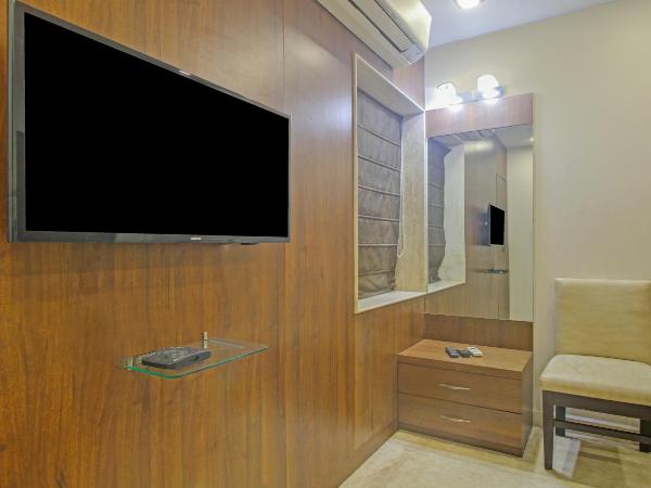 Treebo Sreema Salt Lake : photo 5 de la chambre chambre double Économique