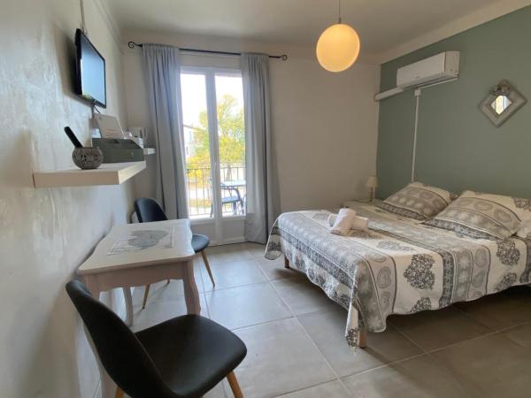 Hotel Carina : photo 5 de la chambre chambre double - vue sur jardin