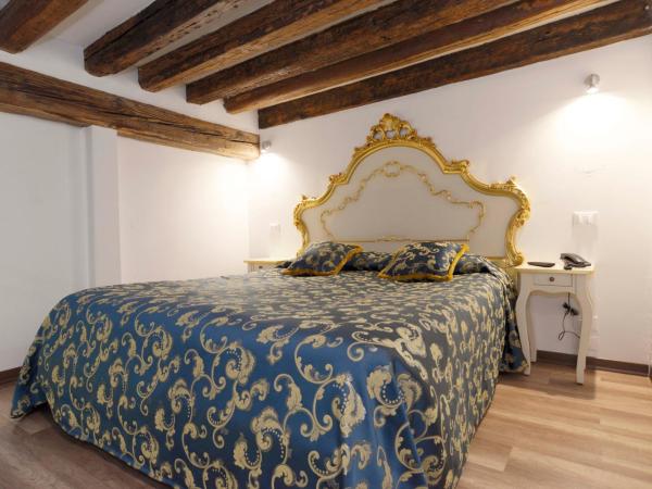 Al Mascaron Ridente : photo 5 de la chambre chambre double ou lits jumeaux