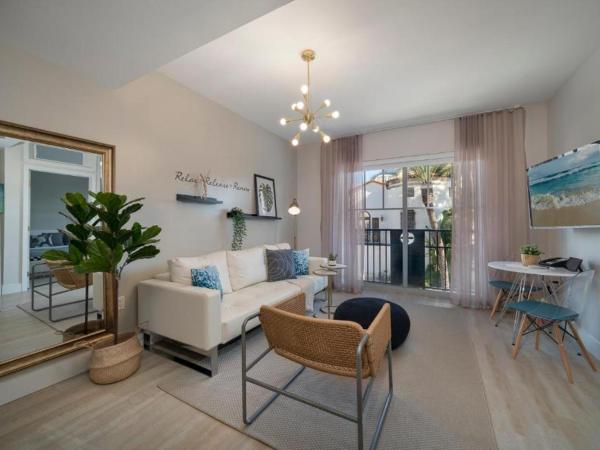 Strand Ocean Drive Suites : photo 2 de la chambre suite 1 chambre lit king-size au dernier Étage avec vue sur le parc lummus - unité d303