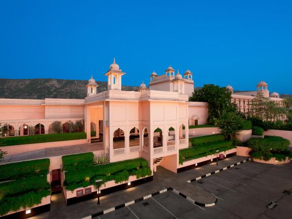 Trident Jaipur : photo 1 de la chambre chambre deluxe avec balcon - vue sur jardin