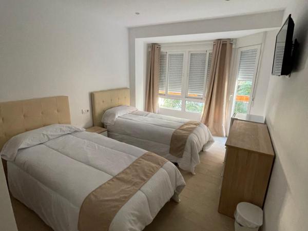 Pensión Portugal : photo 4 de la chambre chambre double ou lits jumeaux avec salle de bains commune