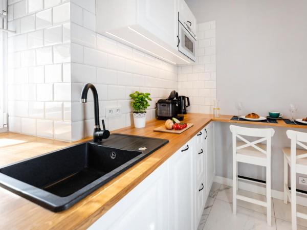 Main Square Apartments : photo 5 de la chambre appartement 1 chambre 1er Étage - vue sur arrière-cour