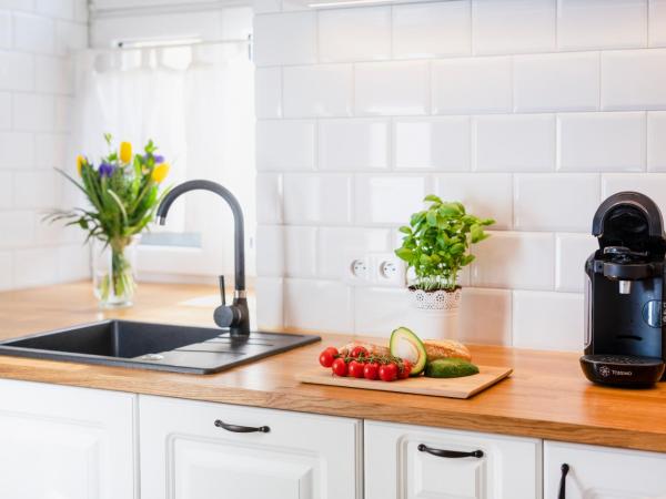 Main Square Apartments : photo 9 de la chambre appartement 1 chambre 1er Étage - vue sur arrière-cour