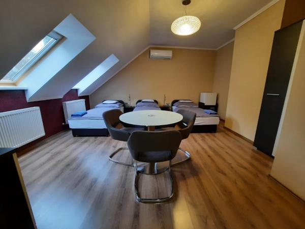 Borostyán Panzió : photo 3 de la chambre chambre triple avec salle de bains privative