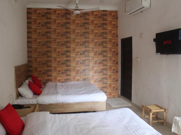 Hotel Heritage High : photo 1 de la chambre chambre deluxe avec 2 lits doubles