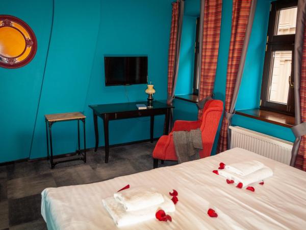 Apartamenty Siedem Komnat Siedmiu Mistrzów : photo 6 de la chambre chambre double ou lits jumeaux avec douche