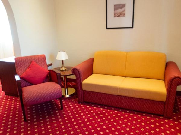 Hotel Haus am Zoo : photo 3 de la chambre chambre triple confort avec vue sur jardin