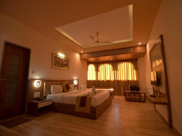 Gold Nest Rubystone Heritage : photo 2 de la chambre chambre triple de luxe