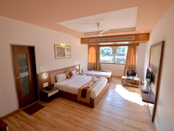 Gold Nest Rubystone Heritage : photo 3 de la chambre chambre triple de luxe