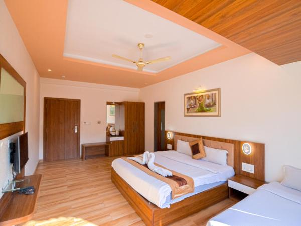 Gold Nest Rubystone Heritage : photo 5 de la chambre chambre triple de luxe