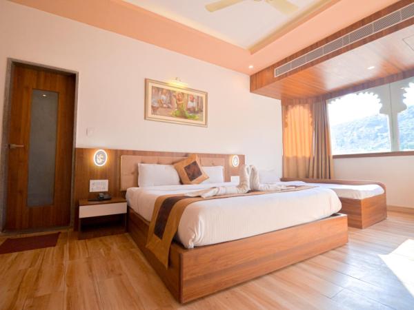 Gold Nest Rubystone Heritage : photo 6 de la chambre chambre triple de luxe