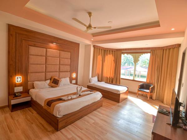 Gold Nest Rubystone Heritage : photo 9 de la chambre chambre triple de luxe