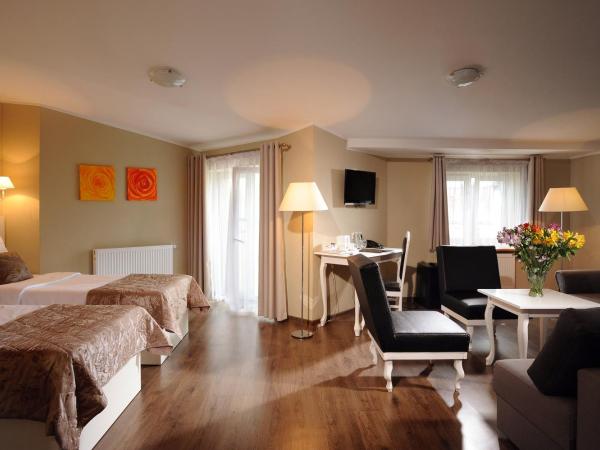 Leone Aparthotel : photo 5 de la chambre chambre triple