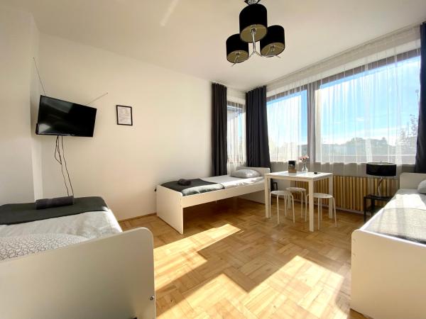 Pokoje Rezydencja Parysa : photo 4 de la chambre chambre triple avec salle de bains commune