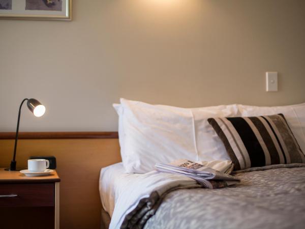 Dunedin Leisure Lodge - Distinction : photo 4 de la chambre hébergement lit king-size standard