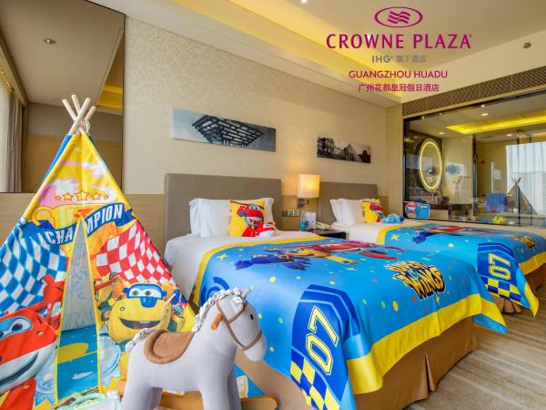 Crowne Plaza Guangzhou Huadu, an IHG Hotel - Free shuttle between hotel and Exhibition Center during Canton Fair & Exhibitor registration Counter : photo 4 de la chambre premium double room with two double beds and garden view - kids theme
