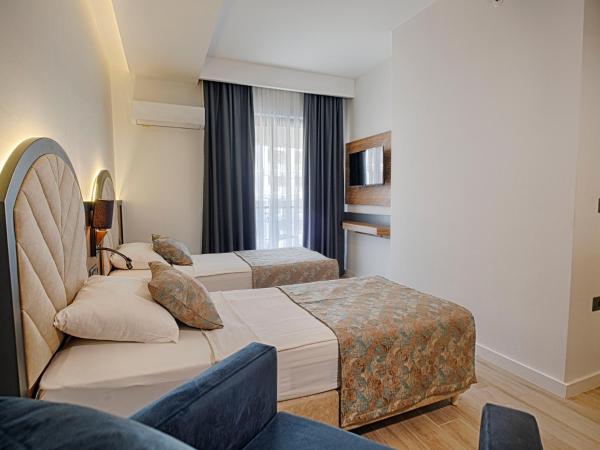 Grand Uysal Beach & Spa Hotel : photo 1 de la chambre chambre familiale
