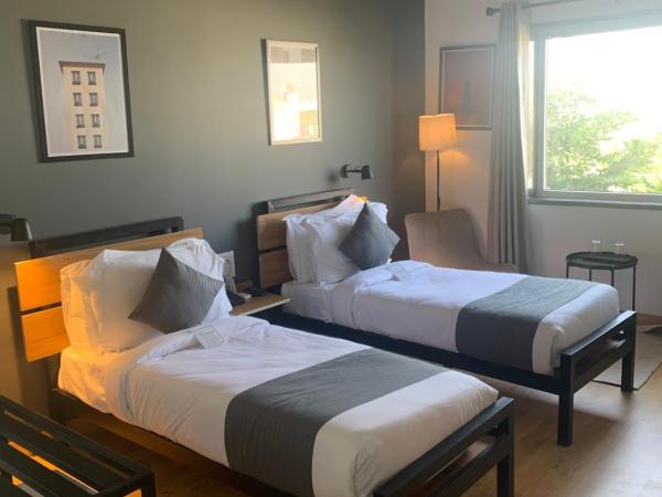 Loft 24, Mansarovar : photo 1 de la chambre chambre lits jumeaux deluxe