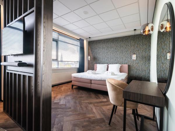 Onderwijshotel De Rooi Pannen Eindhoven : photo 1 de la chambre suite deluxe avec lit king-size