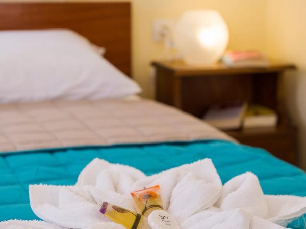 Penelopi Rooms : photo 5 de la chambre chambre lits jumeaux