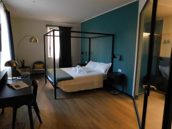 Piumaviola Beds & Apartments : photo 1 de la chambre suite avec jacuzzi