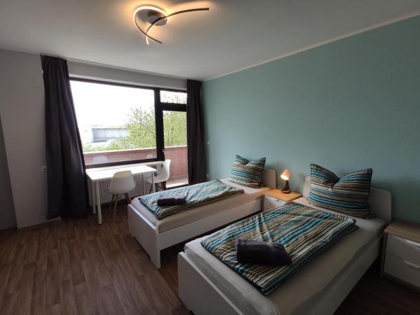 HOME at FRIENDS - City - Zu Hause bei Freunden : photo 2 de la chambre appartement en duplex