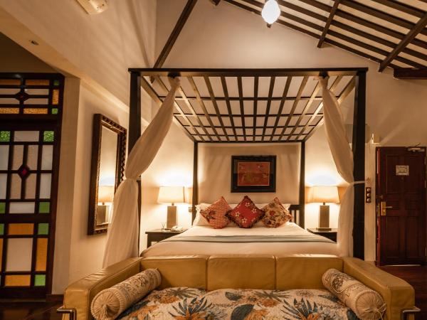 Hotel Penaga : photo 6 de la chambre chambre lit king-size hutton deluxe avec jacuzzi