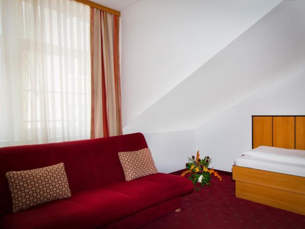 Garten- und Kunsthotel Gabriel City : photo 6 de la chambre chambre quadruple