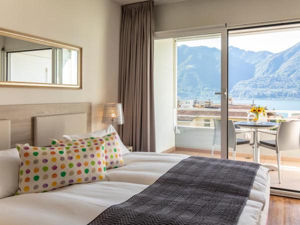 Smart-HOTEL MINUSIO, a Benvenuti Hotel : photo 3 de la chambre chambre double avec balcon – vue sur lac