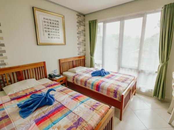 Urbanest Inn House TB Simatupang : photo 1 de la chambre chambre lits jumeaux deluxe