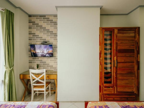 Urbanest Inn House TB Simatupang : photo 3 de la chambre chambre lits jumeaux deluxe