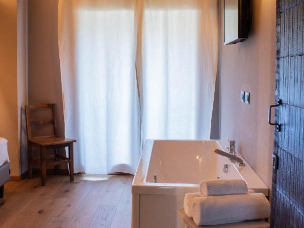 Maison Bionaz Ski & Sport : photo 3 de la chambre deluxe double room with hot tub and balcony