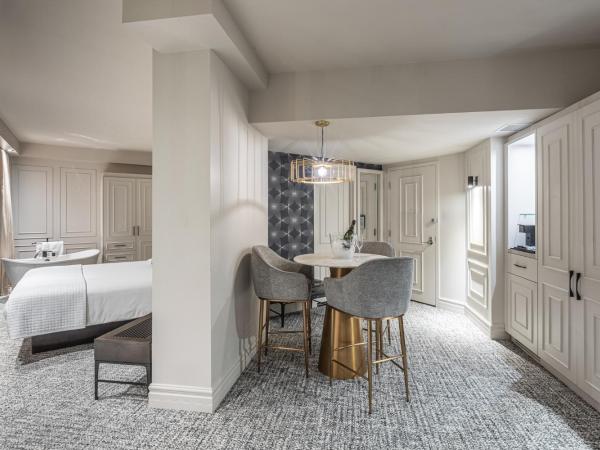 Le Capitole Hotel : photo 9 de la chambre suite lit king-size