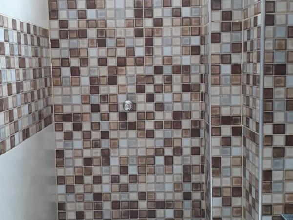 Pousada Restaurante Sol de Liz : photo 7 de la chambre chambre quadruple avec salle de bains