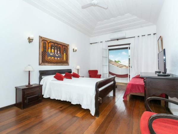 Pousada Afrika : photo 1 de la chambre chambre triple supérieure - vue sur mer