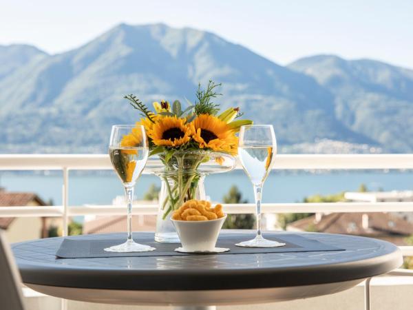 Smart-HOTEL MINUSIO, a Benvenuti Hotel : photo 5 de la chambre chambre double avec balcon – vue sur lac