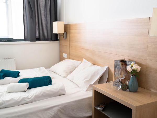 WOW City Hostel : photo 5 de la chambre chambre double avec salle de bains privative