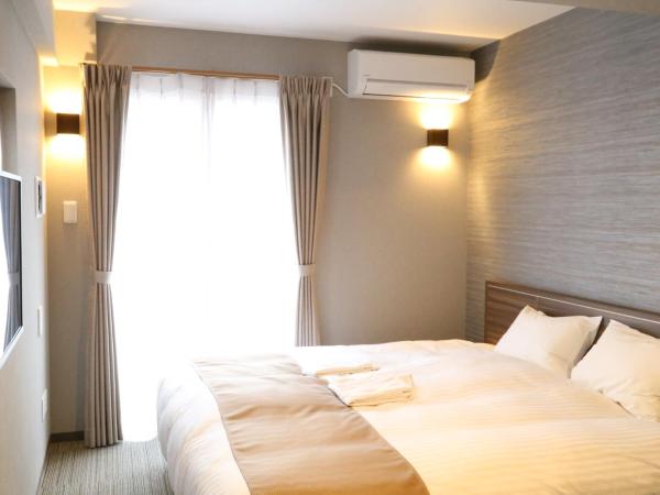 C＆Jホテル : photo 9 de la chambre chambre lits jumeaux