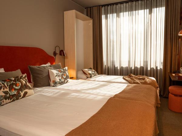 Spar Hotel Majorna : photo 2 de la chambre chambre triple plus