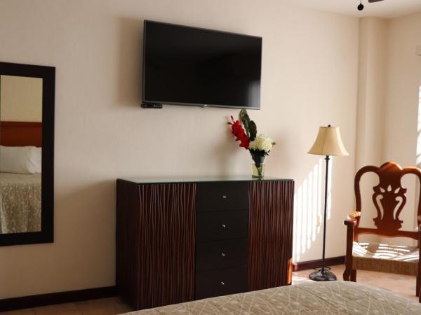 Mar Sol Bungalows & Hotel : photo 2 de la chambre chambre quadruple
