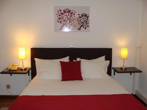 Hotel Botanico de Coimbra : photo 7 de la chambre chambre double ou lits jumeaux