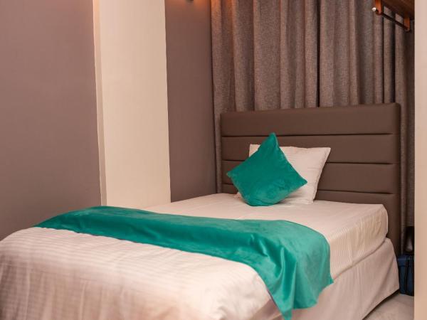 Dhimyaath Stay : photo 4 de la chambre chambre simple avec balcon