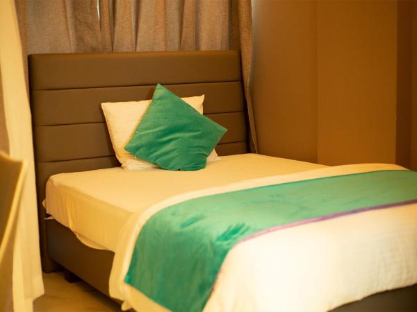 Dhimyaath Stay : photo 3 de la chambre chambre simple avec balcon