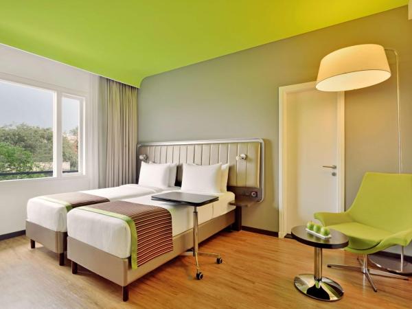 Park Inn by Radisson,South Delhi : photo 1 de la chambre chambre deluxe double ou lits jumeaux