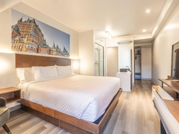 Hôtel Manoir Vieux-Québec : photo 1 de la chambre chambre lit king-size deluxe