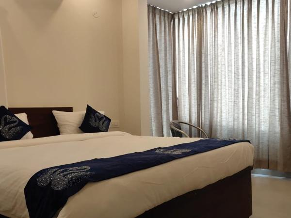 AMULYA FINE DINE RESIDENCY : photo 2 de la chambre chambre double deluxe