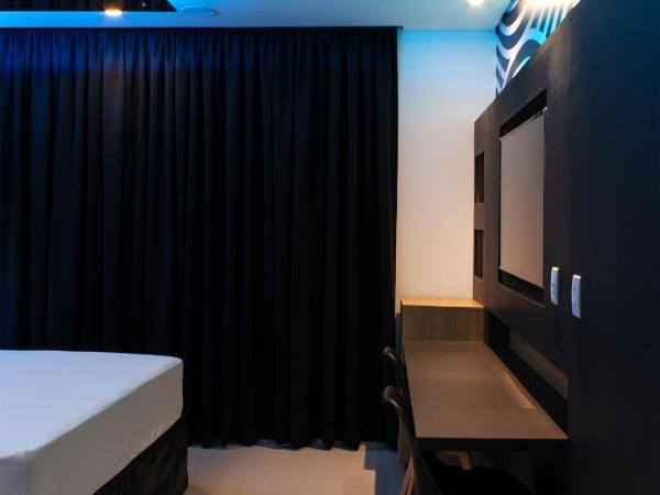 Drops Motel Manaus : photo 7 de la chambre suite lit king-size