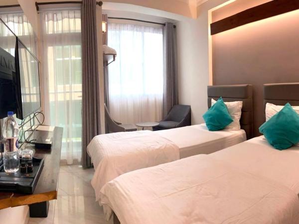 Dhimyaath Stay : photo 1 de la chambre chambre double ou lits jumeaux supérieure avec vue sur ville