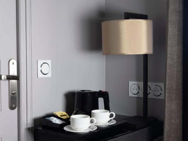 Pavillon Monceau by Happyculture : photo 7 de la chambre chambre double ou lits jumeaux avec balcon